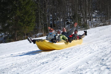Teambuilding zima - snežni rafting Zabava na snegu za podjetja